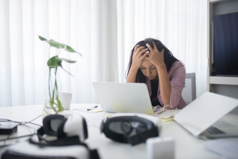 photo of a stressed woman at work
